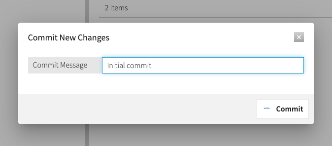 Screen capture of the Commit New Changes dialog with the Commit Message field and the Commit button in the bottom right.