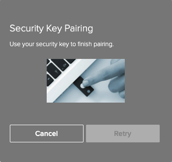 A screen capture of the Security Key registration window prompting you to insert your security key to pair it.